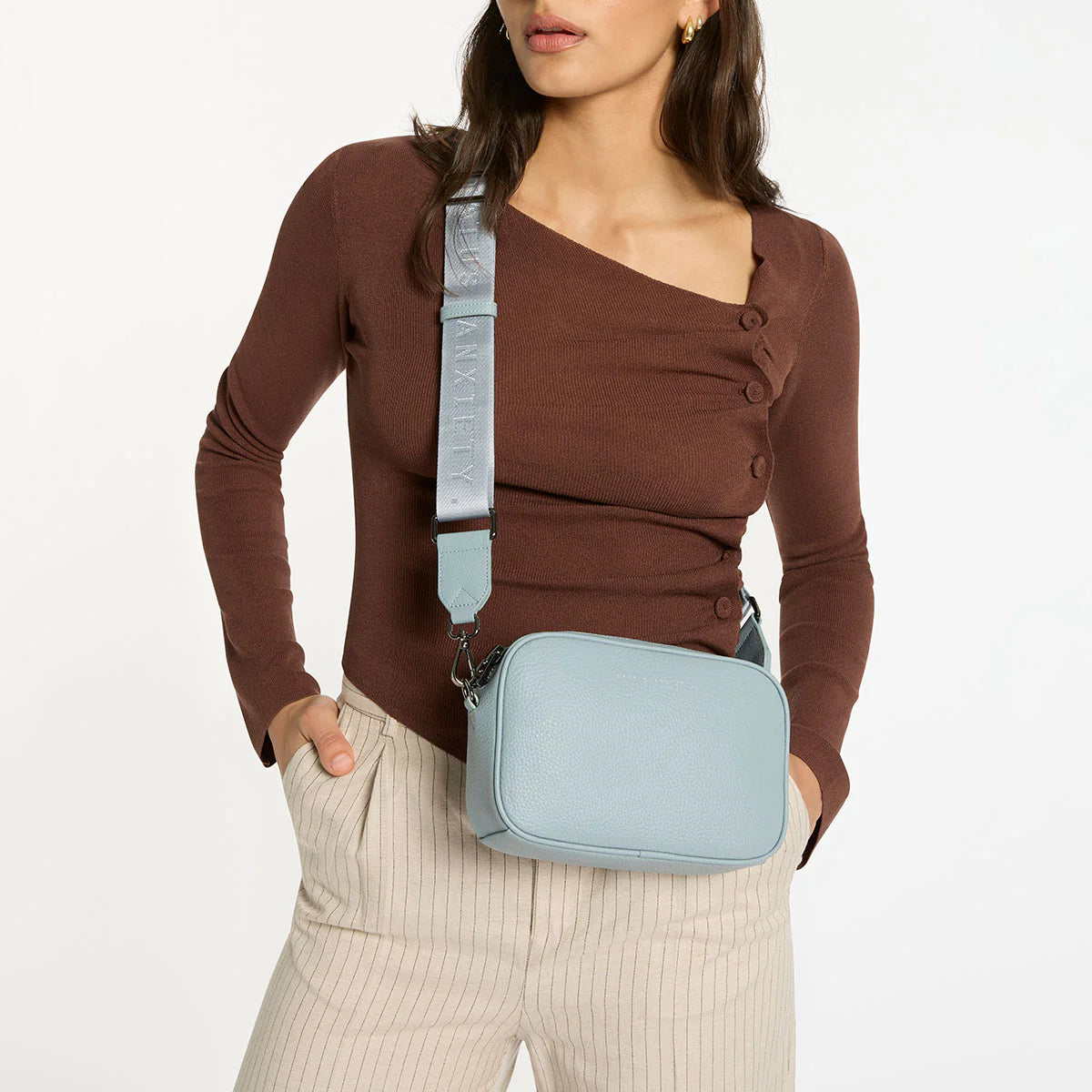Status Anxiety plunder with webbed strap - powder blue