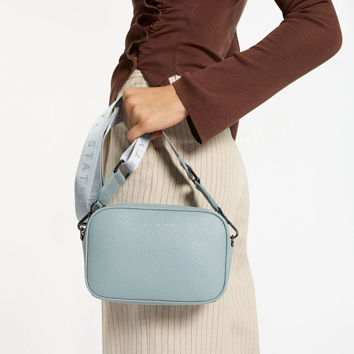 Status Anxiety plunder with webbed strap - powder blue